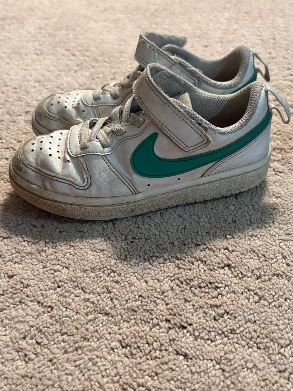 Nike Kids White Sneaker with Teal Swoosh